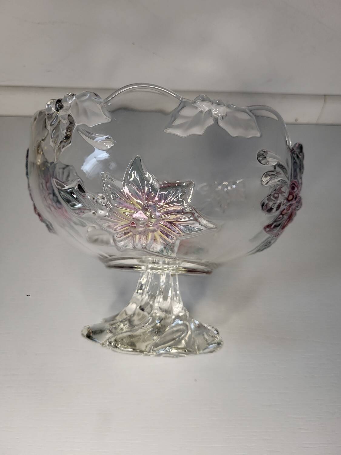 Footed glass fruit bowl