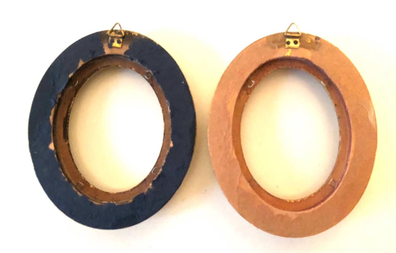 Pair of old oval golden wood frames
