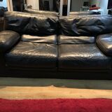 Pair of 2-seater sofas in black leather Roche & Bobois