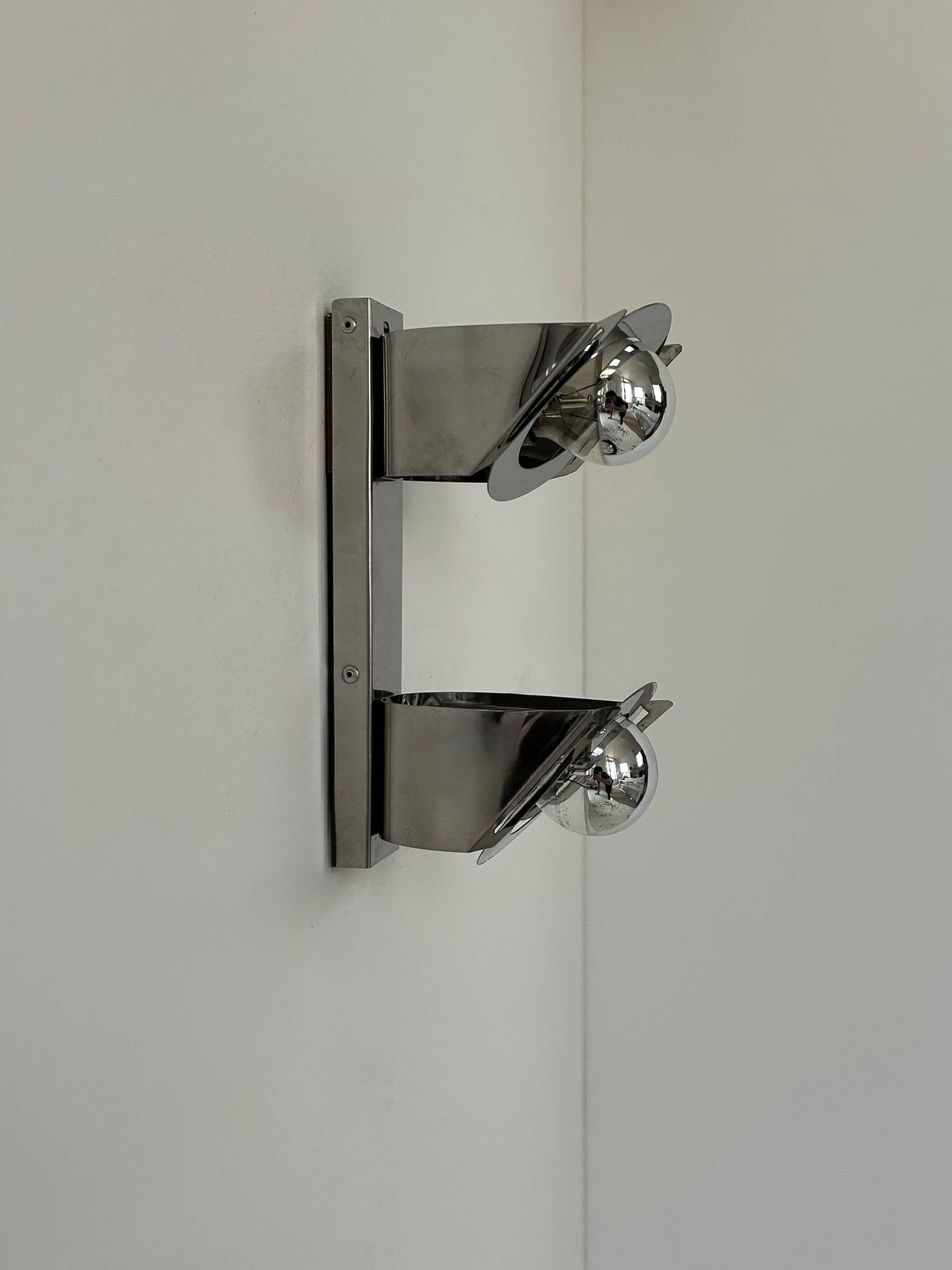 Pair of vintage wall lights, chrome metal, France, 1970.