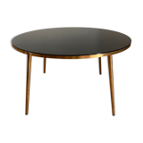 Table basse plateau verre noir et pieds compas dorés