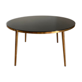 Table basse plateau verre noir et pieds compas dorés