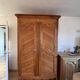 Antique 2-door wardrobe made of solid wood with shelves and drawers.