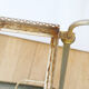 Glass and gold metal wheeled serving table 1960
