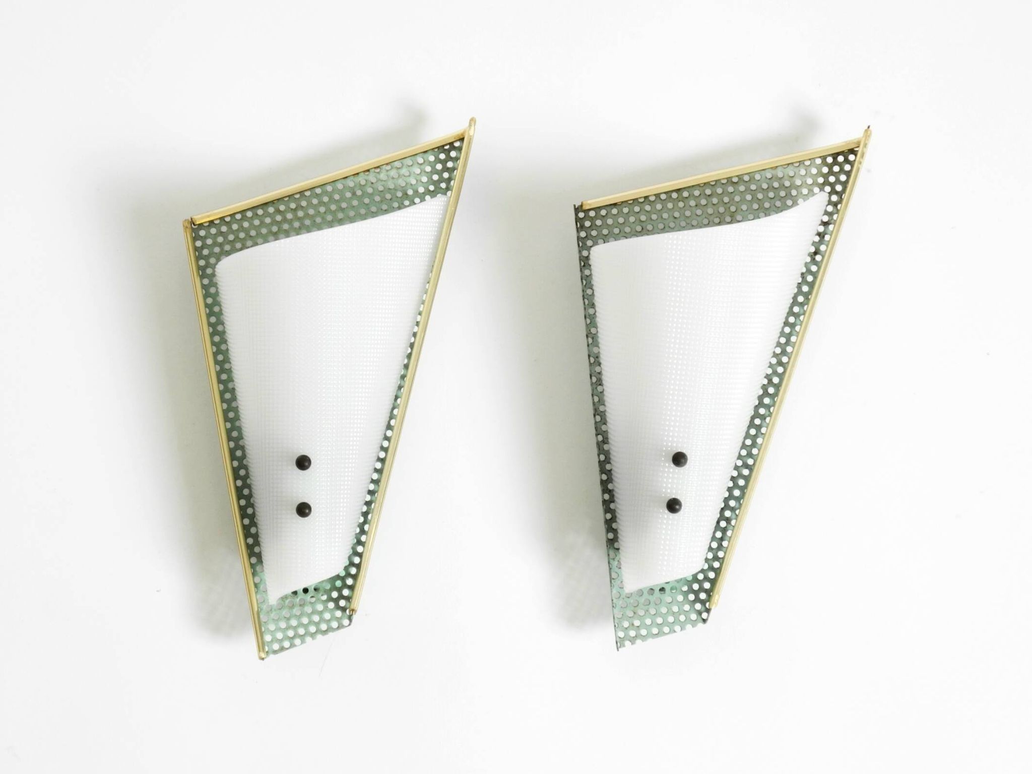 Pair of beautiful mint green Mid Century Modern perforated sheet metal wall