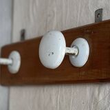 Wall-mounted coat rack with 2 hooks, vintage 1960s white lacquered metal.