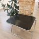 Vintage lot design – Platone table + black Plia chairs – Anonima Castelli