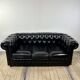 Vintage 1980 black leather Chesterfield sofa