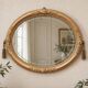 Miroir ovale vintage doré à décor floral et verre biseauté – 58 × 48 cm
