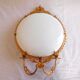 Pair of Napoleon III porcelain and bronze wall lights