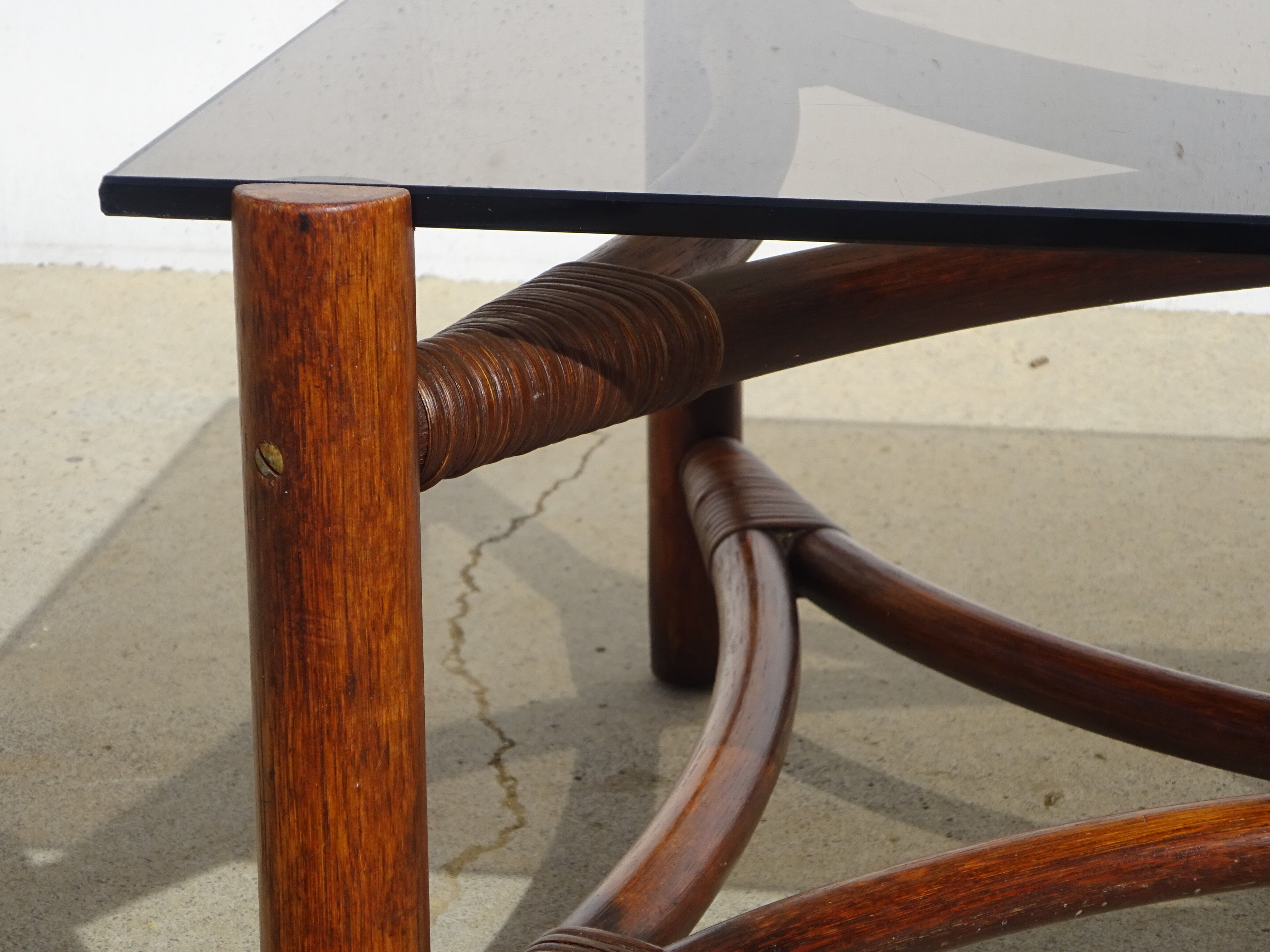 Glass and rattan coffee table