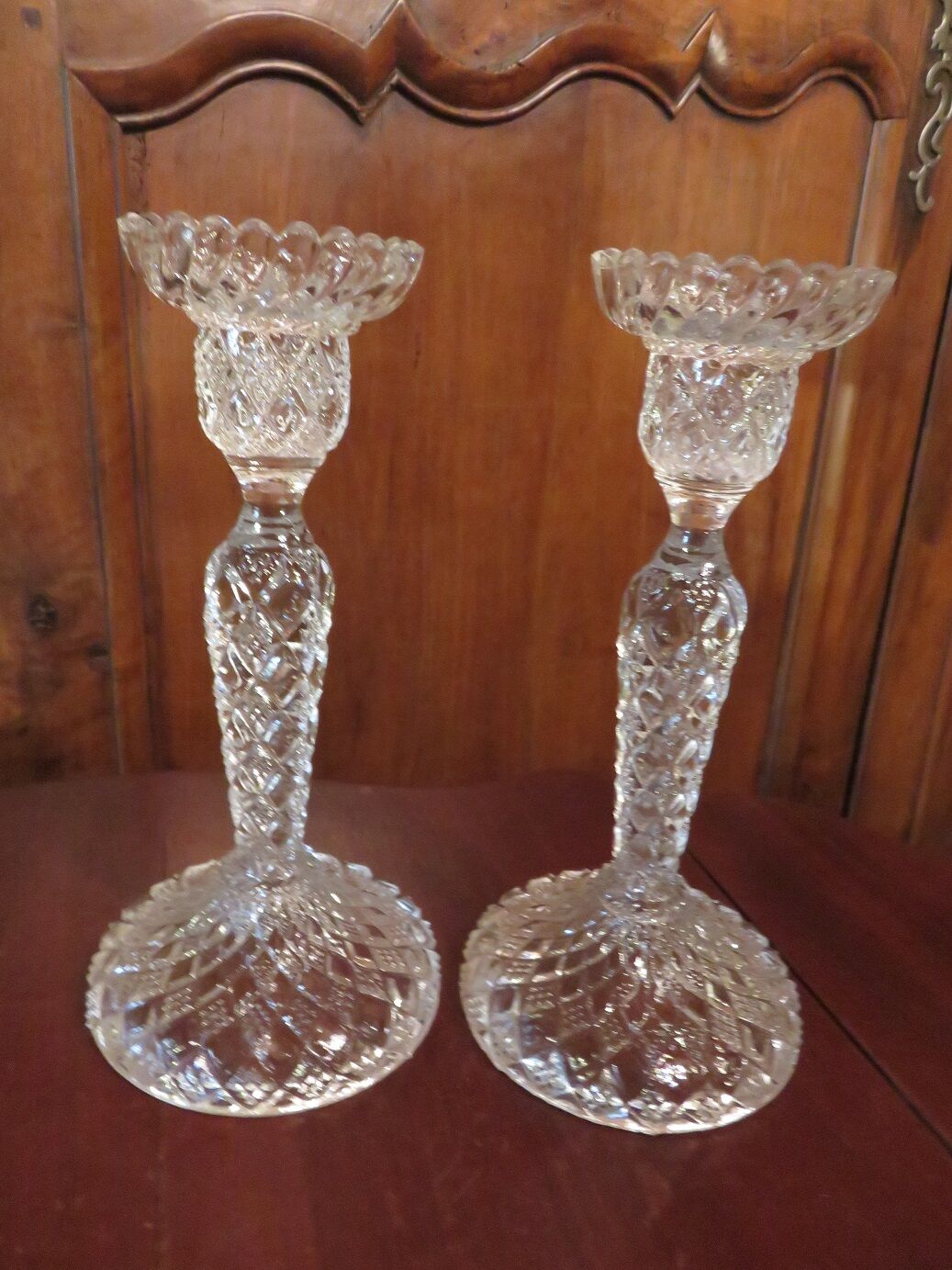pair of molded glass candlesticks