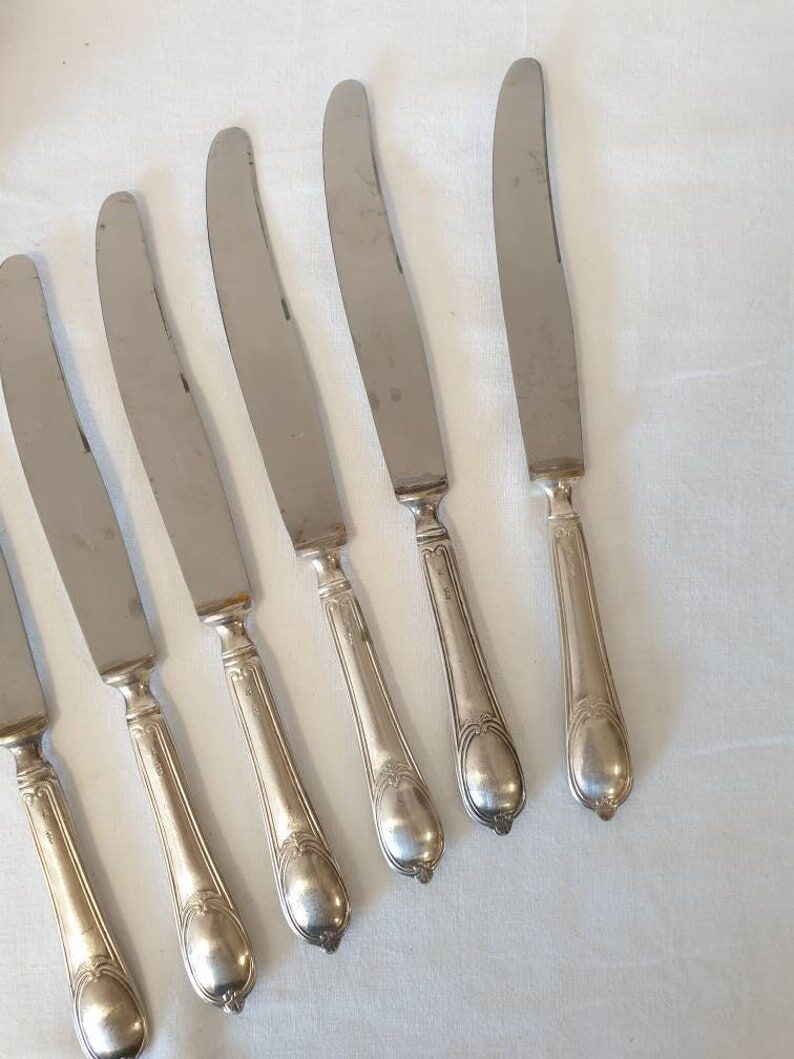 Large antique X6 knives made of silver metal