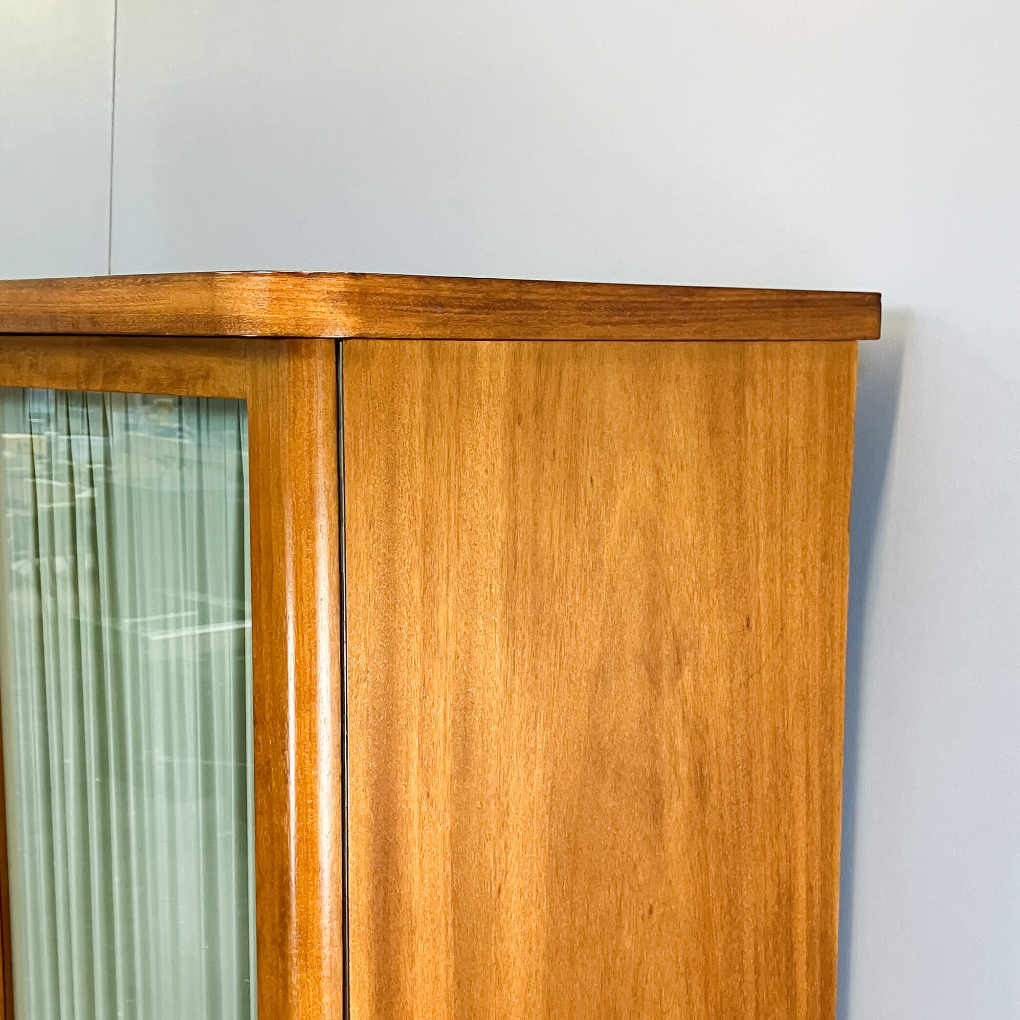 Art Deco cabinet with glass doors, various woods, 1930s