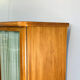 Art Deco cabinet with glass doors, various woods, 1930s