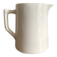 Old white earthenware jug