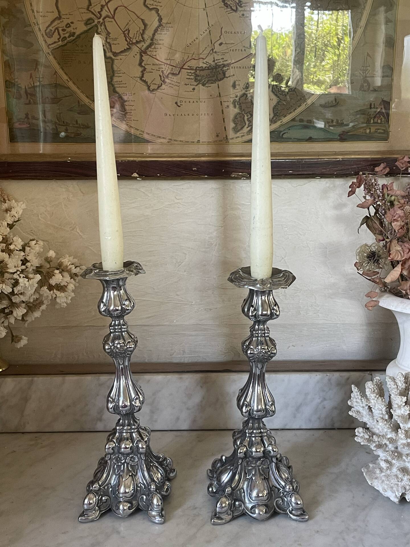 Pair of rococo silver-plated candlesticks
