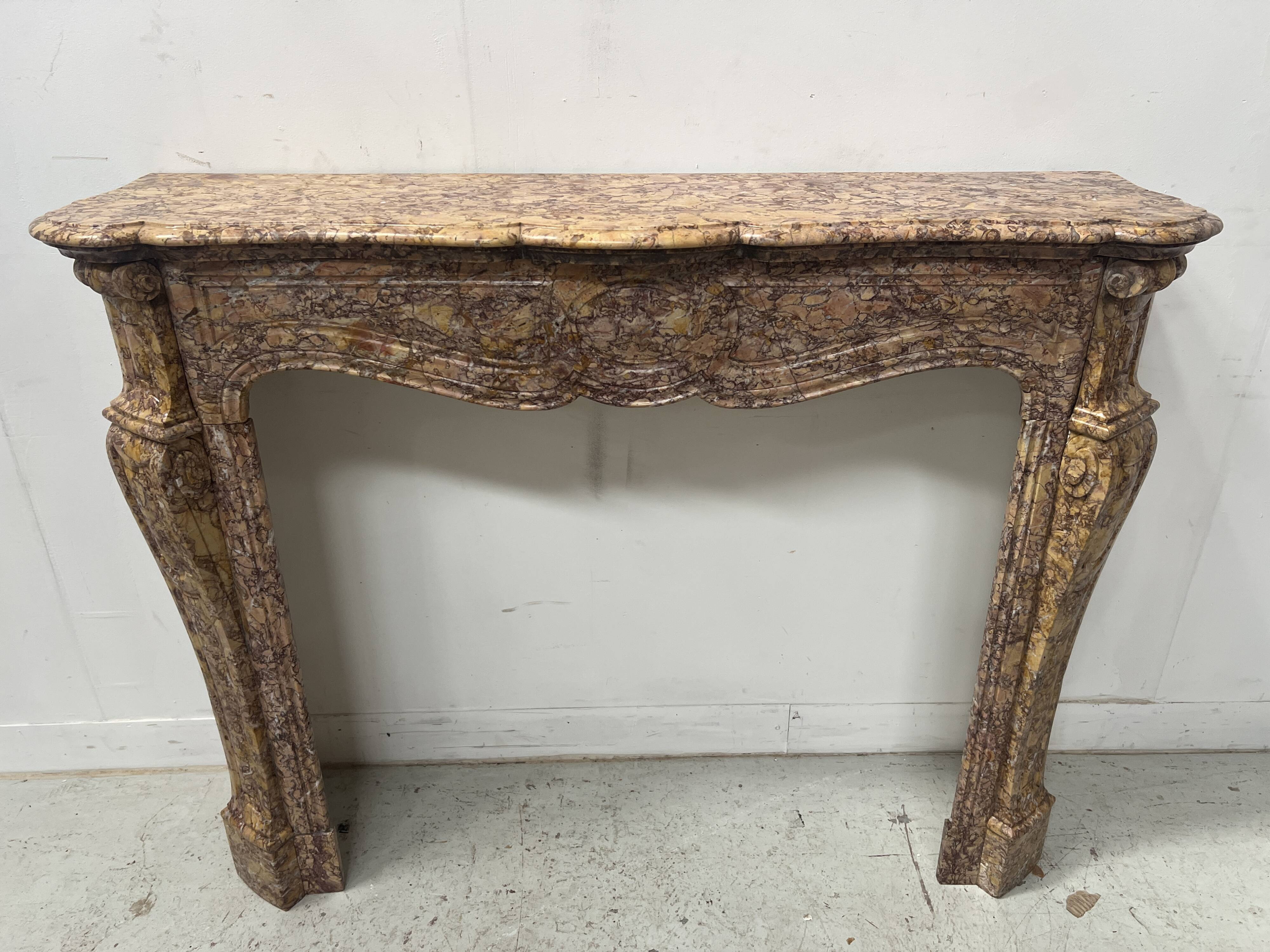 Louis XV style fireplace, Pompadour model, speckled breccia marble, 19th century