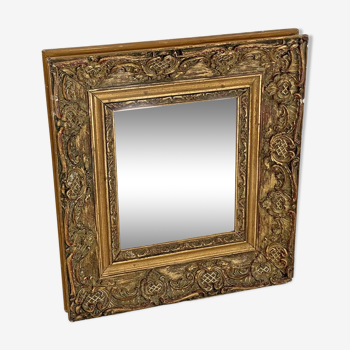 Small old mirror in gilded wood