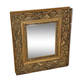 Small old mirror in gilded wood