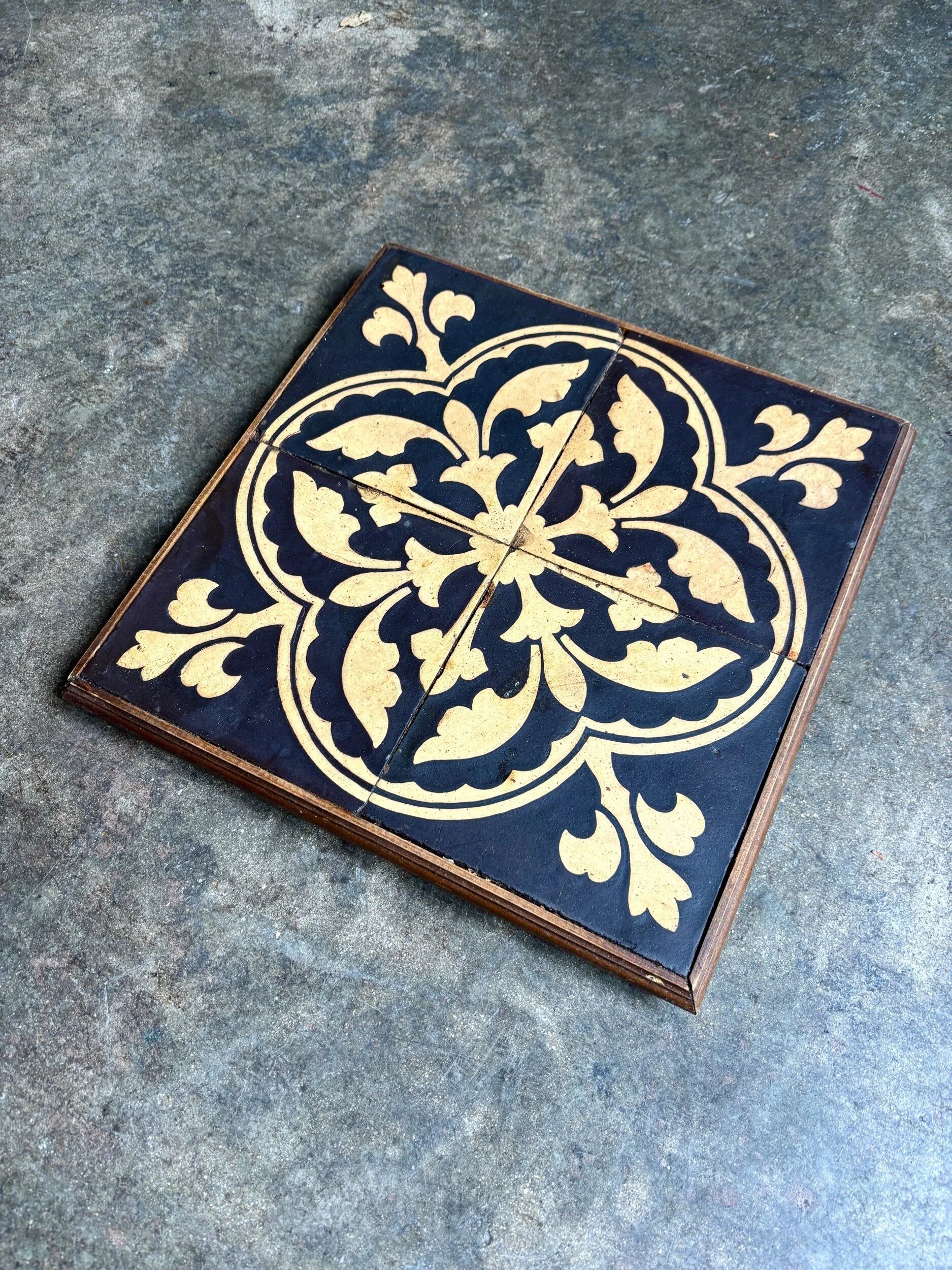 Wooden trivet and cement tiles, 1880