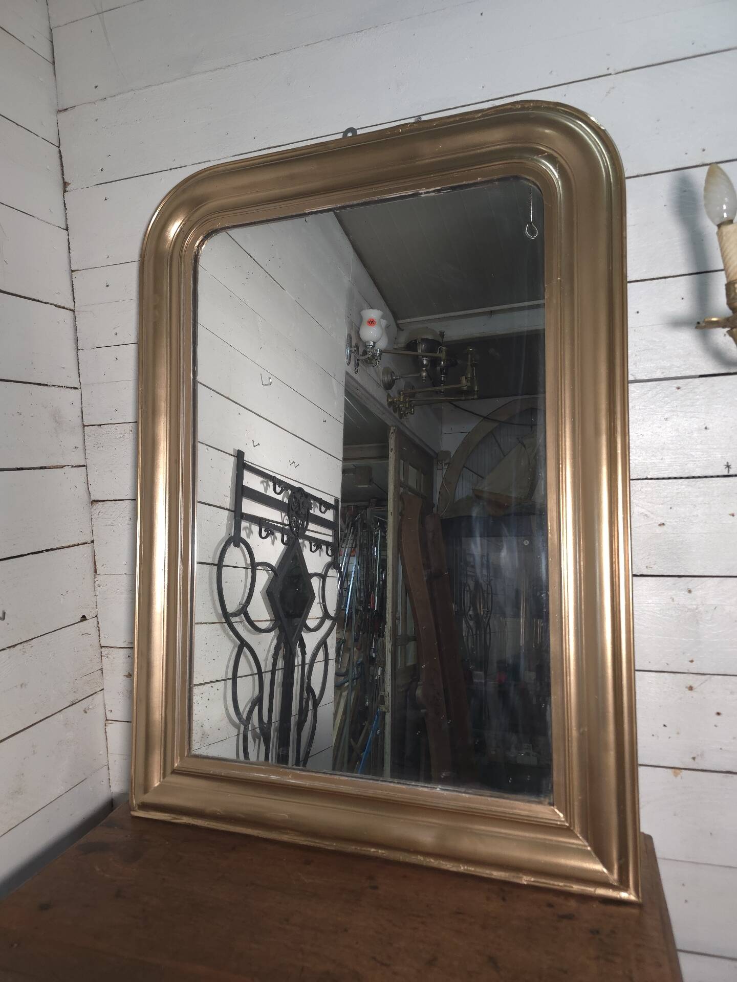 Golden mirror in Louis Philippe style