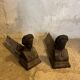 Paire de chenets en fonte visage
