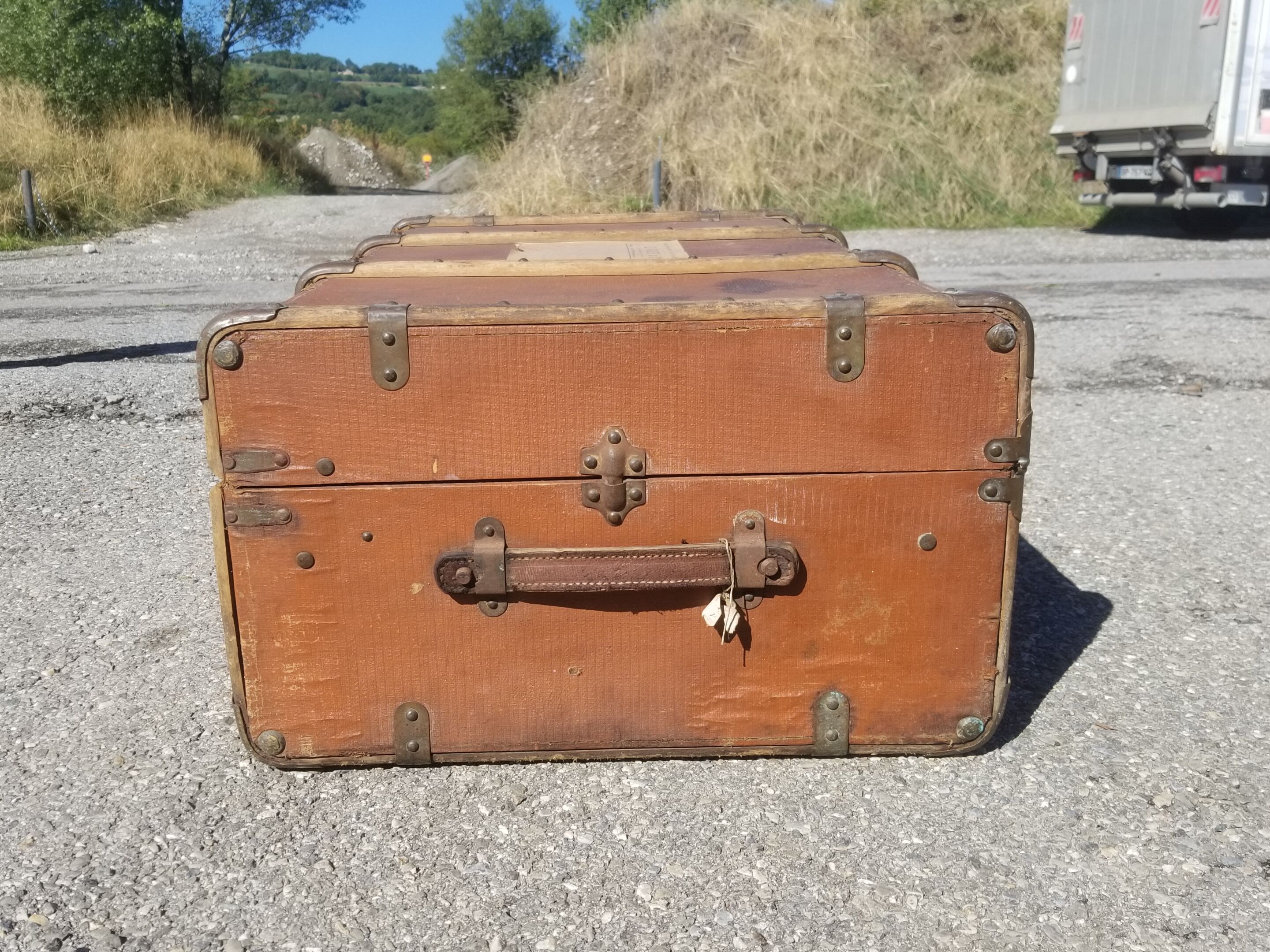 Old travel trunk made of wood and brass