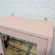 Small pink bathroom cabinet