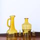 Set of two vintage amber glass carafes attributed to Lubiana.