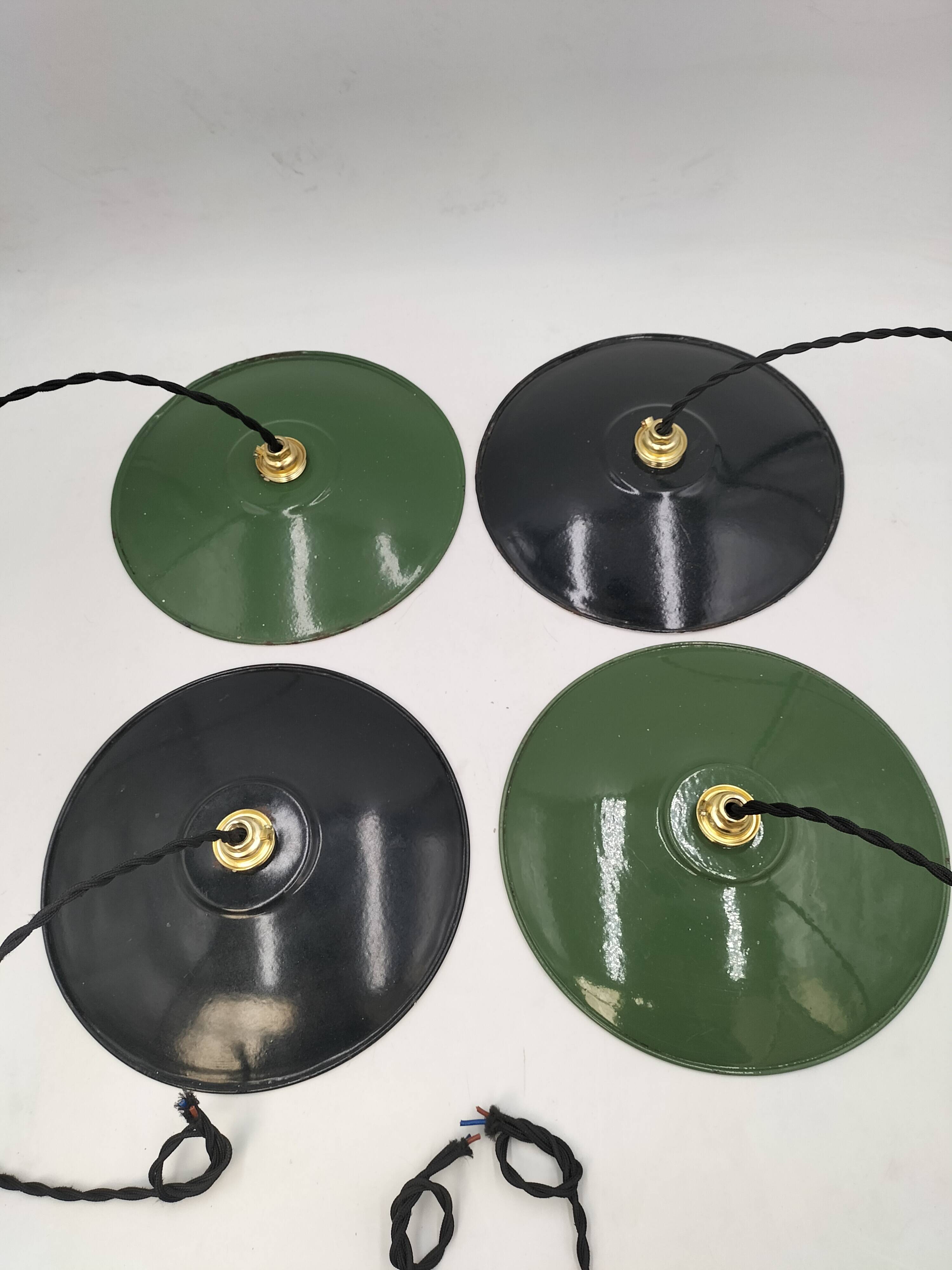4 enameled sheet metal pendants