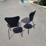 Pairs of wooden chairs