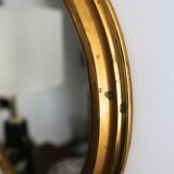 Miroir oval en laiton