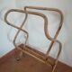 Rattan cradle with its support