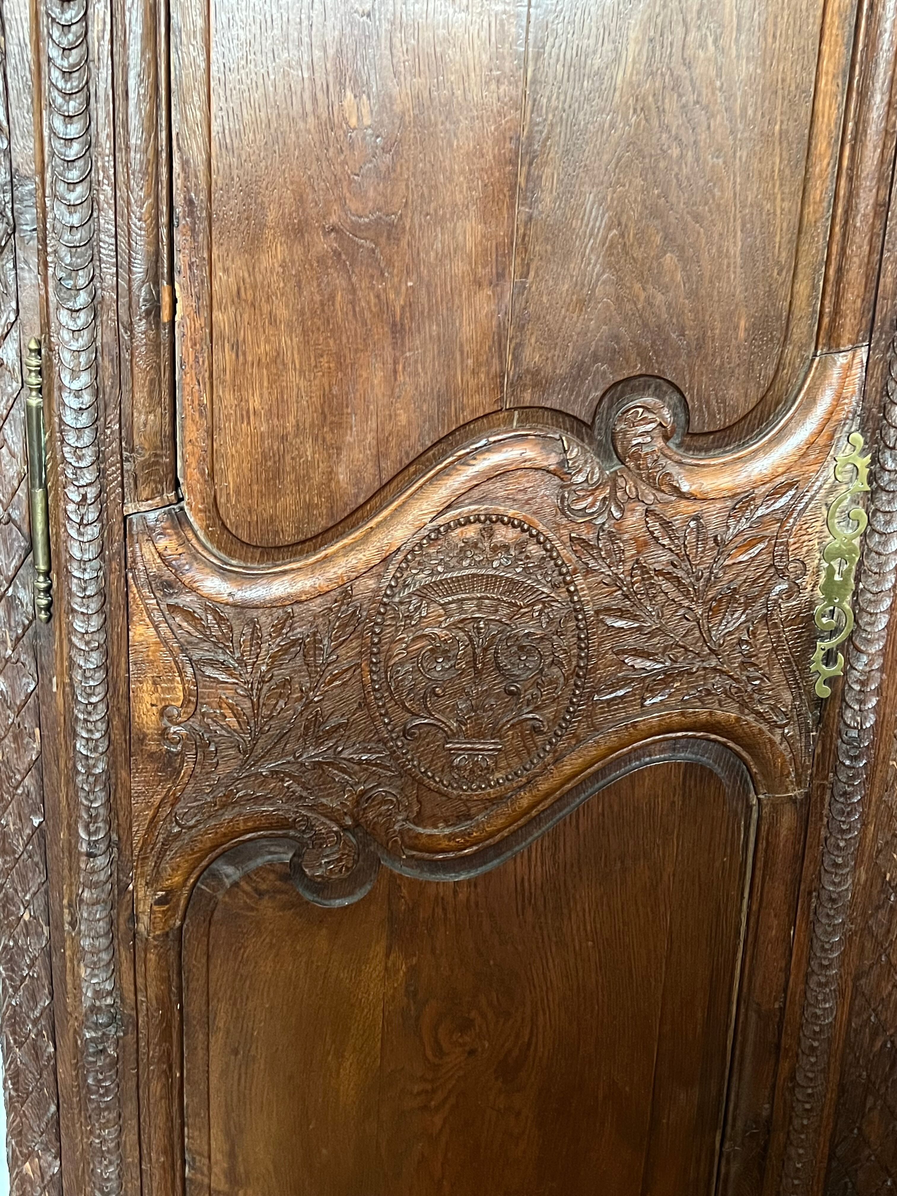 Beautiful and ancient Norman wedding wardrobe, richly carved