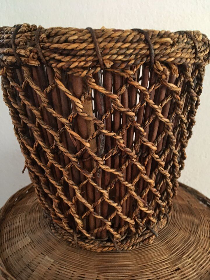 Two pot covers in Wicker, rope and wood.