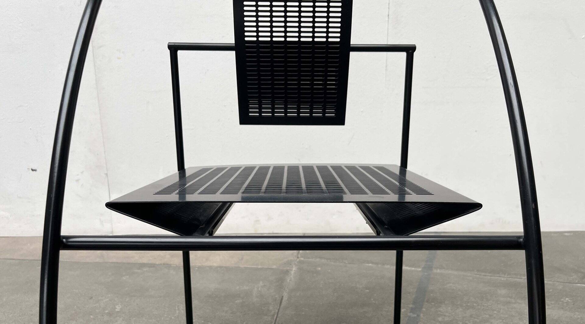 Postmodern black Quinta chair in perforated metal by Mario Botta for Alias, 1980s.