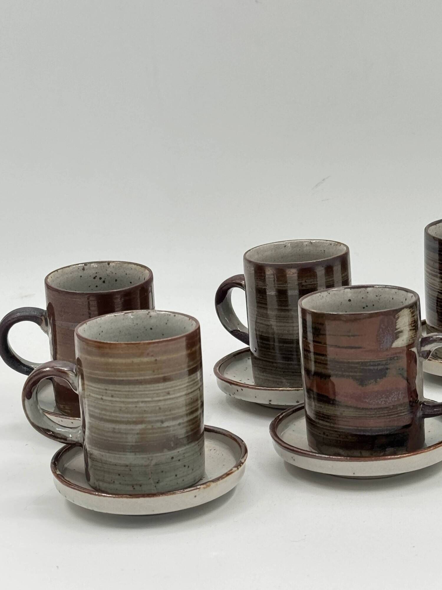 Set of 6 vintage handmade stoneware cups and saucers.