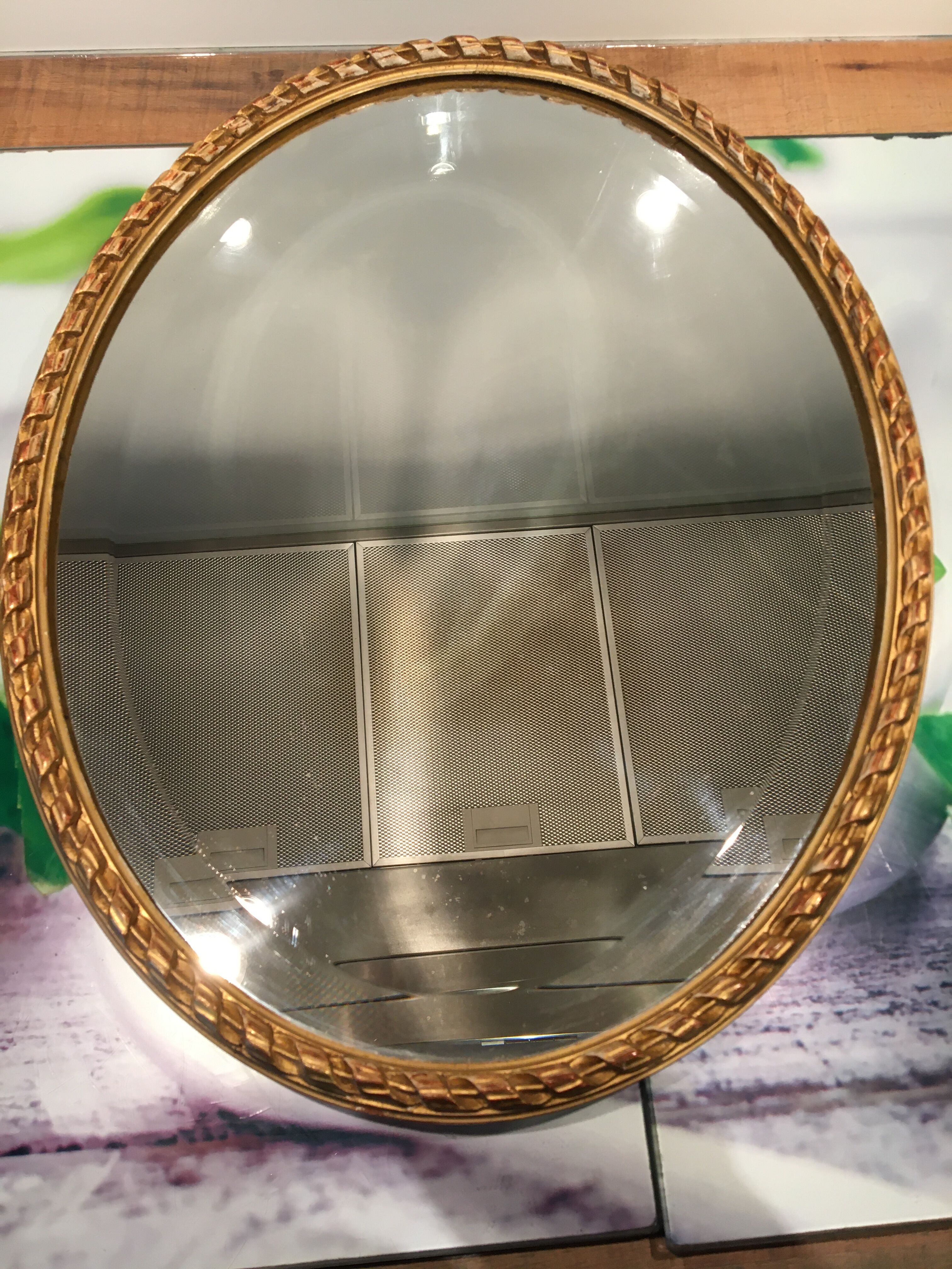 Bevelled golden oval mirror 40x51cm