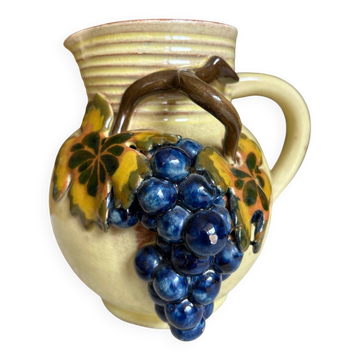 Earthenware jug/carafe HB with grape bunch slip decoration.
