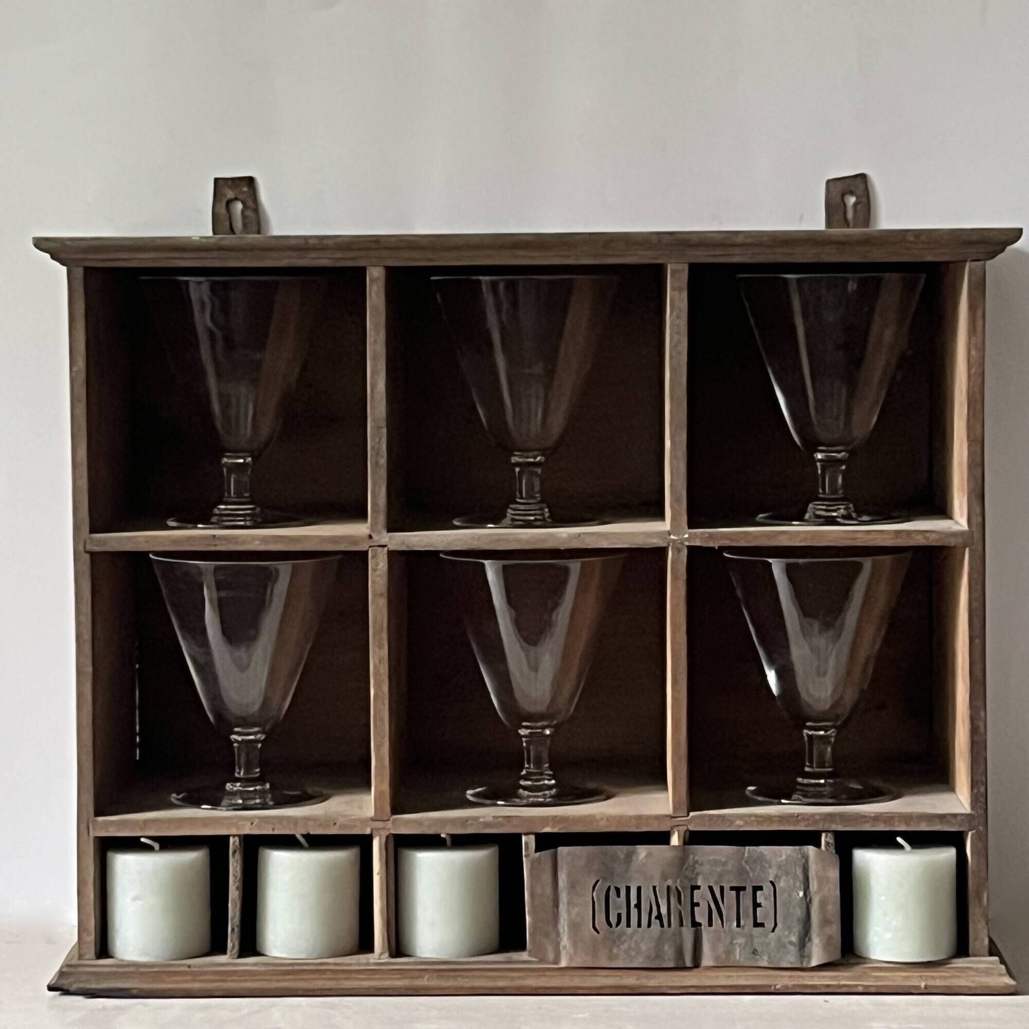 Antique commercial shelving unit with compartments