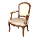 Louis XV period armchair in natural wood with convertible back carved with flowers