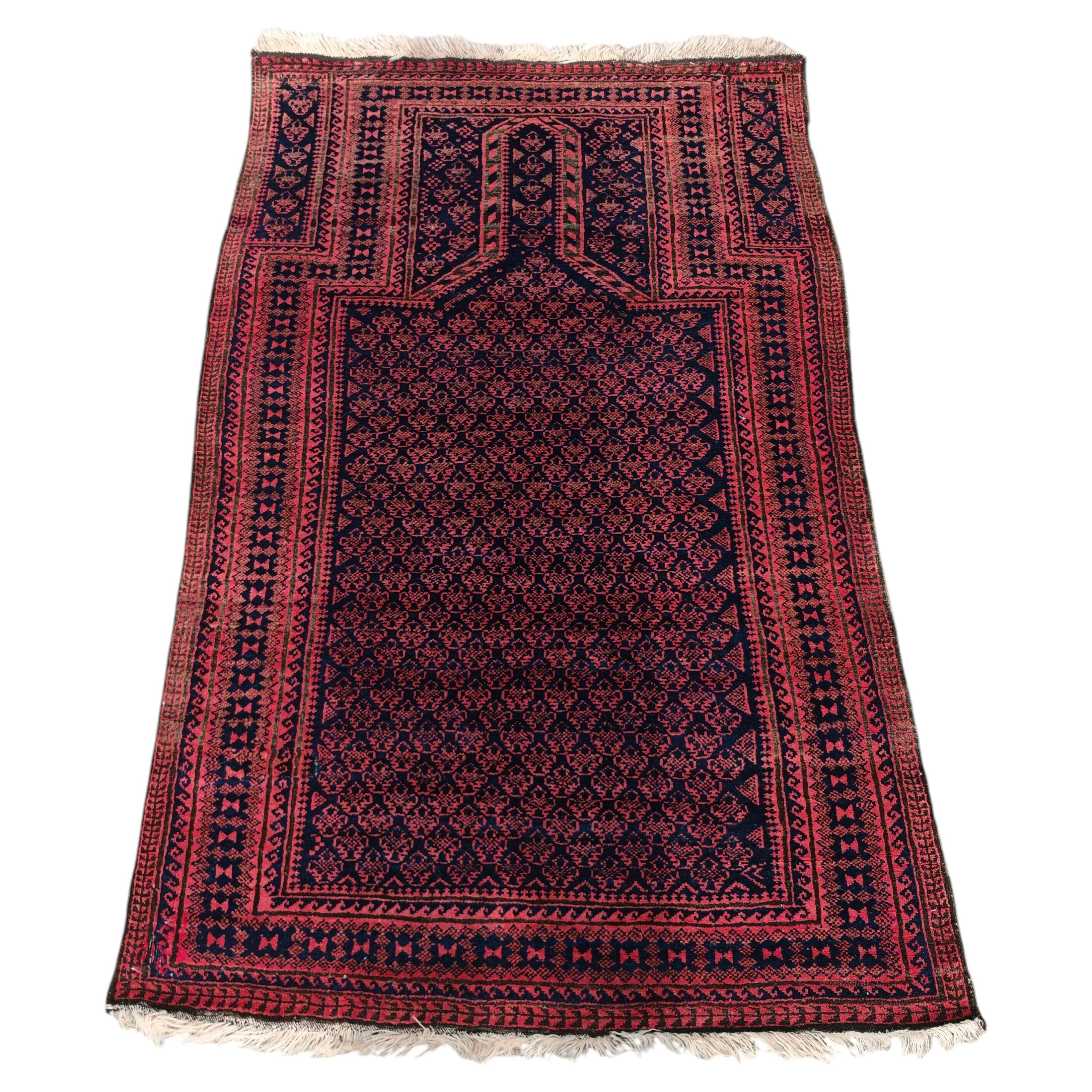 Vintage Persian Baluch prayer rug in wool from the 1950s.