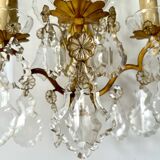 Pair of bronze wall lights and crystal pendants