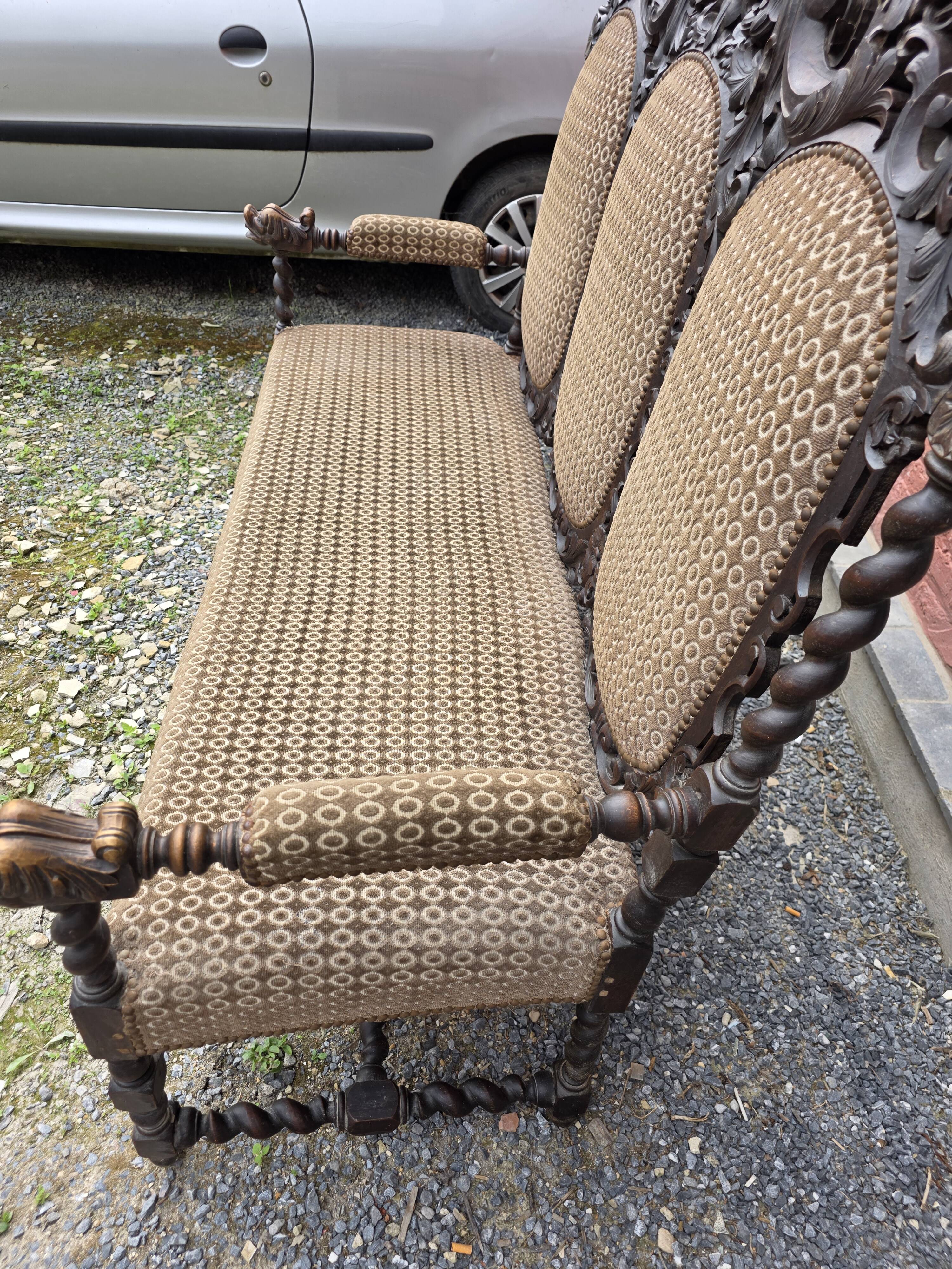 Three-seater armchair in Louis XIII style made of oak from the 19th century.