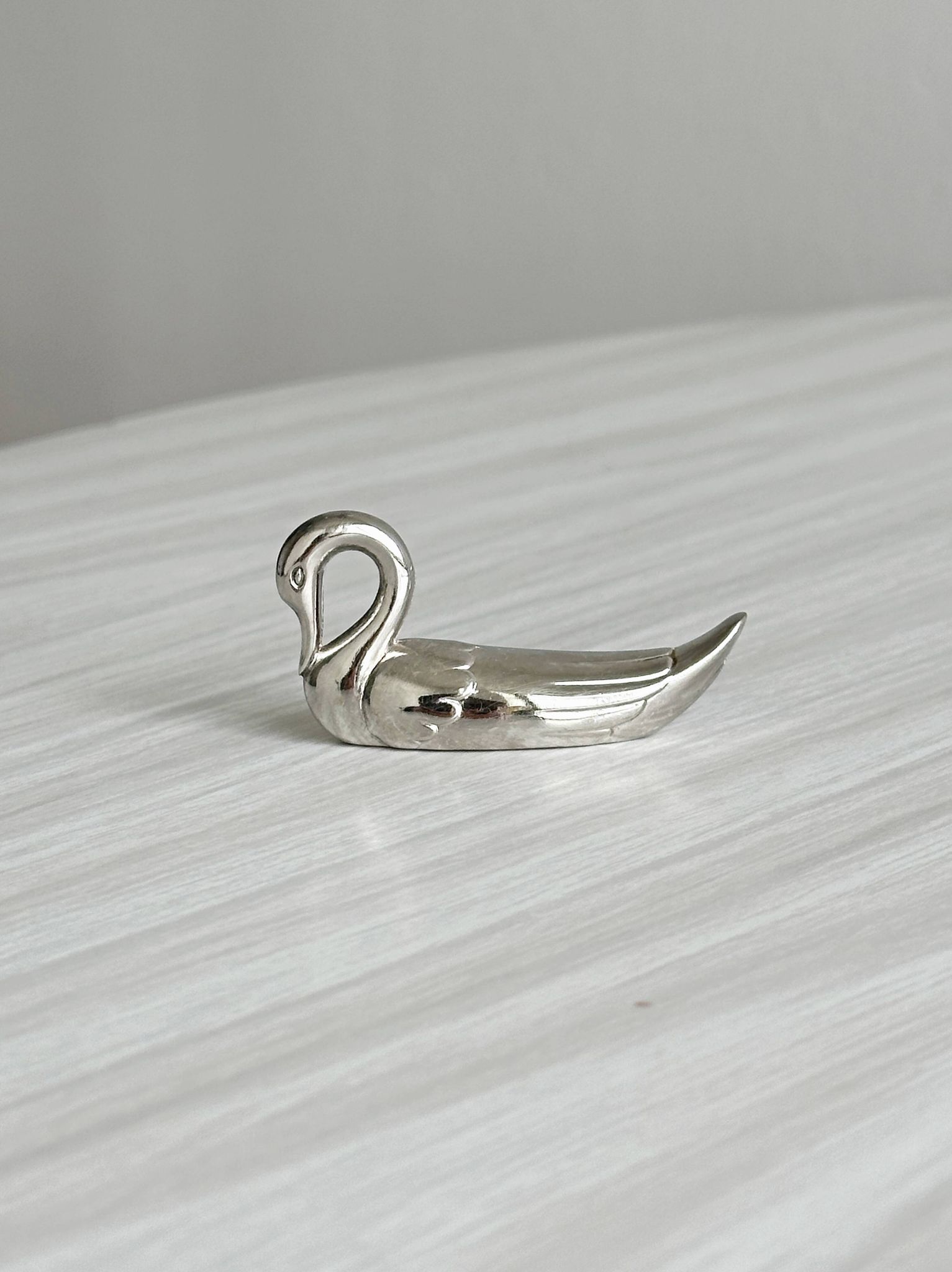 set of 6 metal knife holders in the shape of a swan,