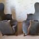Paire de fauteuils Bergère tonneau sculpturale