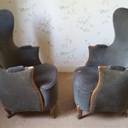Paire de fauteuils Bergère tonneau sculpturale