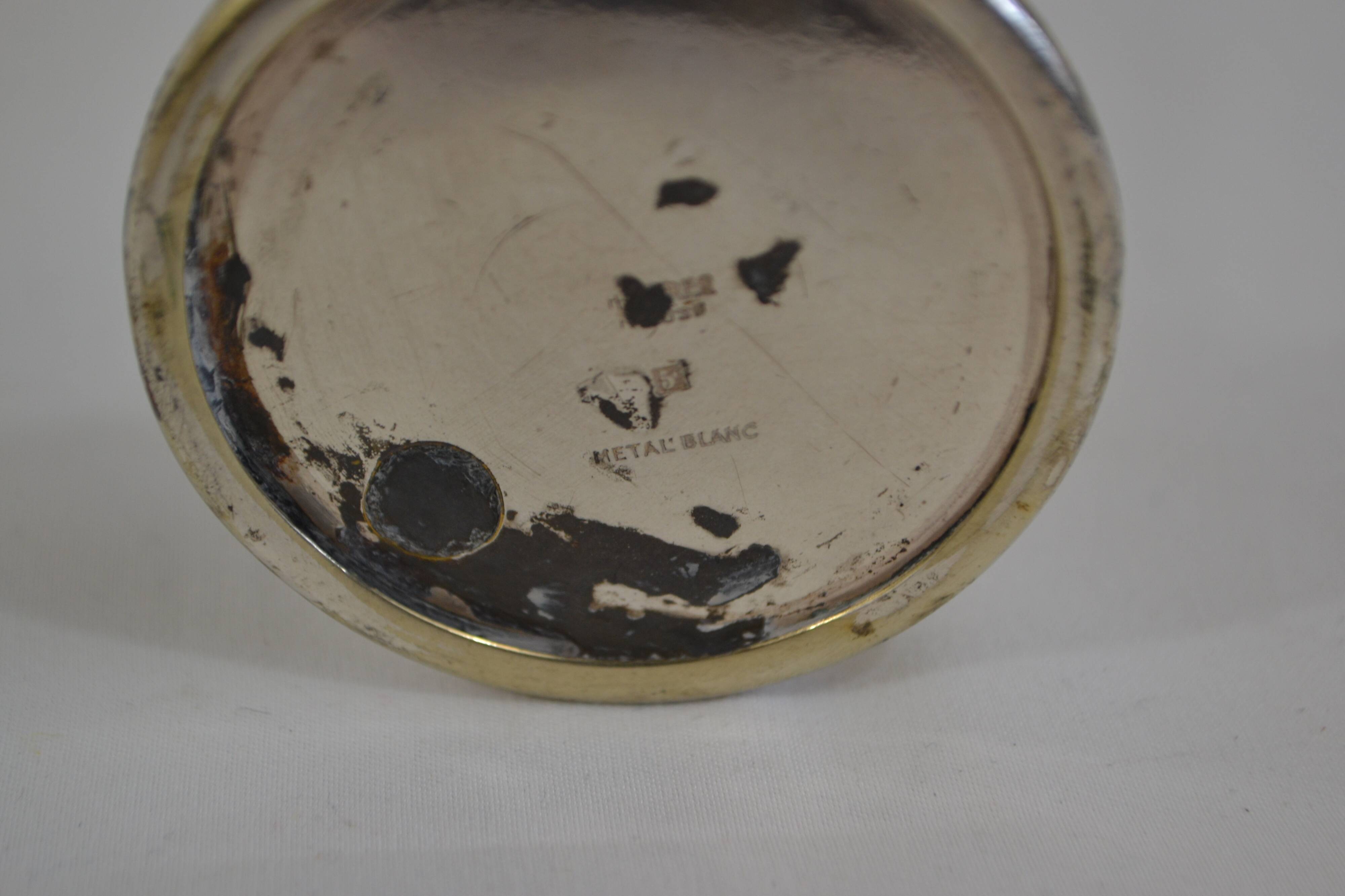 Tin candle holder
