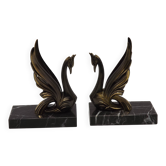 Porte-livres en spelter effet bronzé Art Déco français avec base en marbre noir.